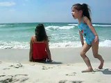kids play at beach in Panama City, Florida