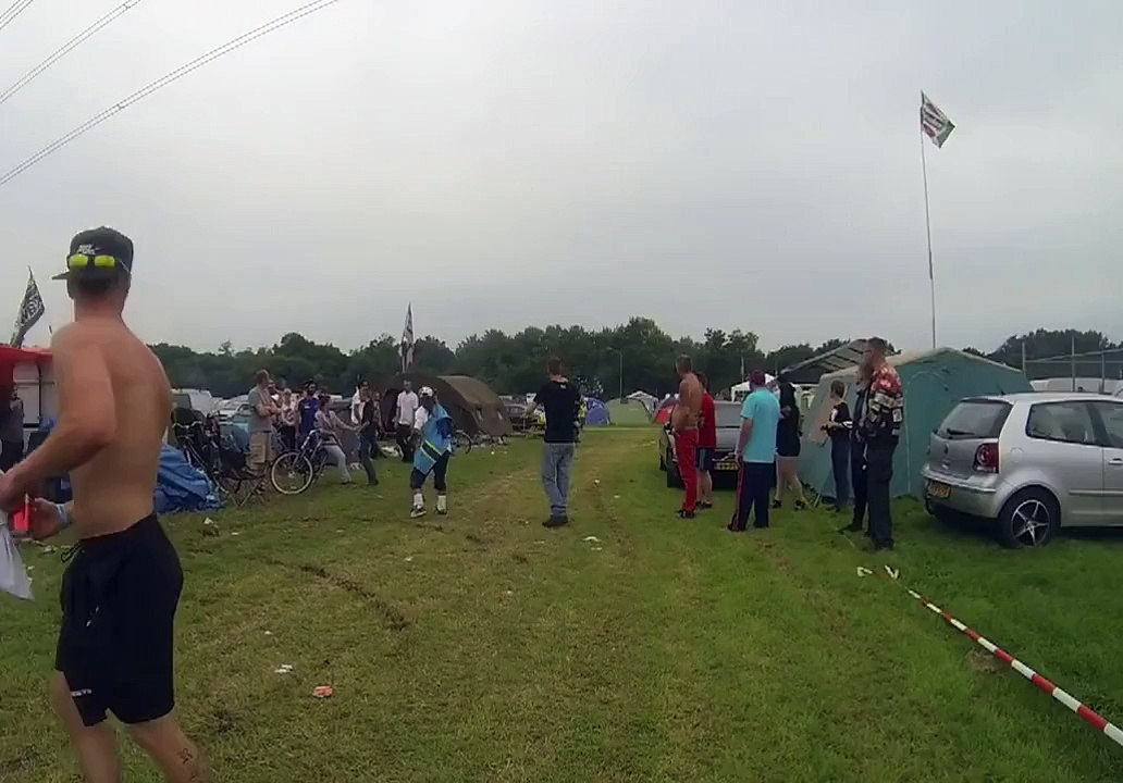 A biker rides on the roof of an rv