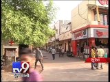 Surat: CCTV footage shows cop savagely beating up trader - Tv9 Gujarati