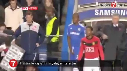 tribünde dişlerini fırçalayan taraftar