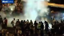 Hong Kong Pro-Democracy Protesters → Police Unleash Tear Gas in Hong Kong Protests (9/28/2014)