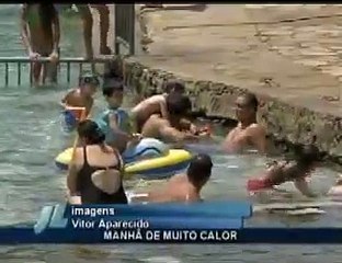 Chuva surpreende em dia quente