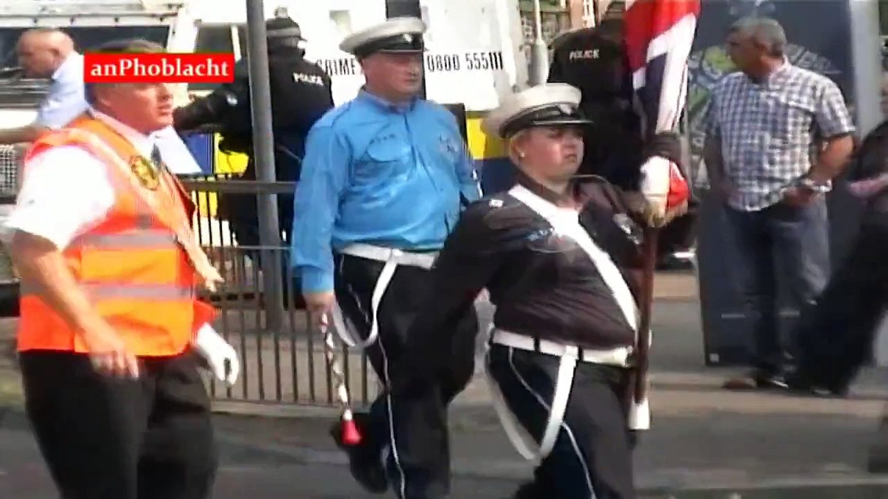 Orange Bands Play 'The Sash' passing St  Patrick's Church in Belfast