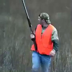 Hunter catches flying bird with bare hand