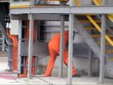Airless Spraying Densi Proof onto Concrete in a Petro Chemical Plant