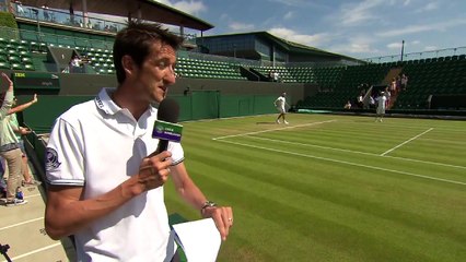 Roger Federer hits the practice court