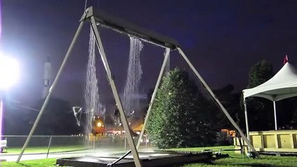 Beautiful Scene Girls Swings into Water Fall