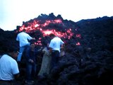 Lighting a cigarette with Lava in Pacaya Volcano Guatemala
