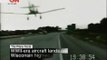 Texan T-6 plane landing highway on emergency