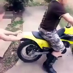Boy Falling Down on The Bike