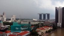 Singapore Flyer hit by lightning & thunder storm over Marina Bay Sands, Singapore