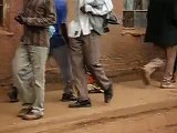 Baby begging on the streets of Kampala