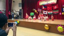 Isabella leads the Japanese dance at her school performance