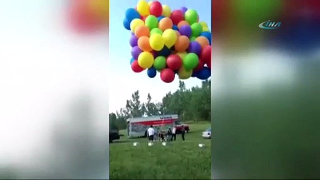 Yüzlerce balonla gökyüzüne yükseldi