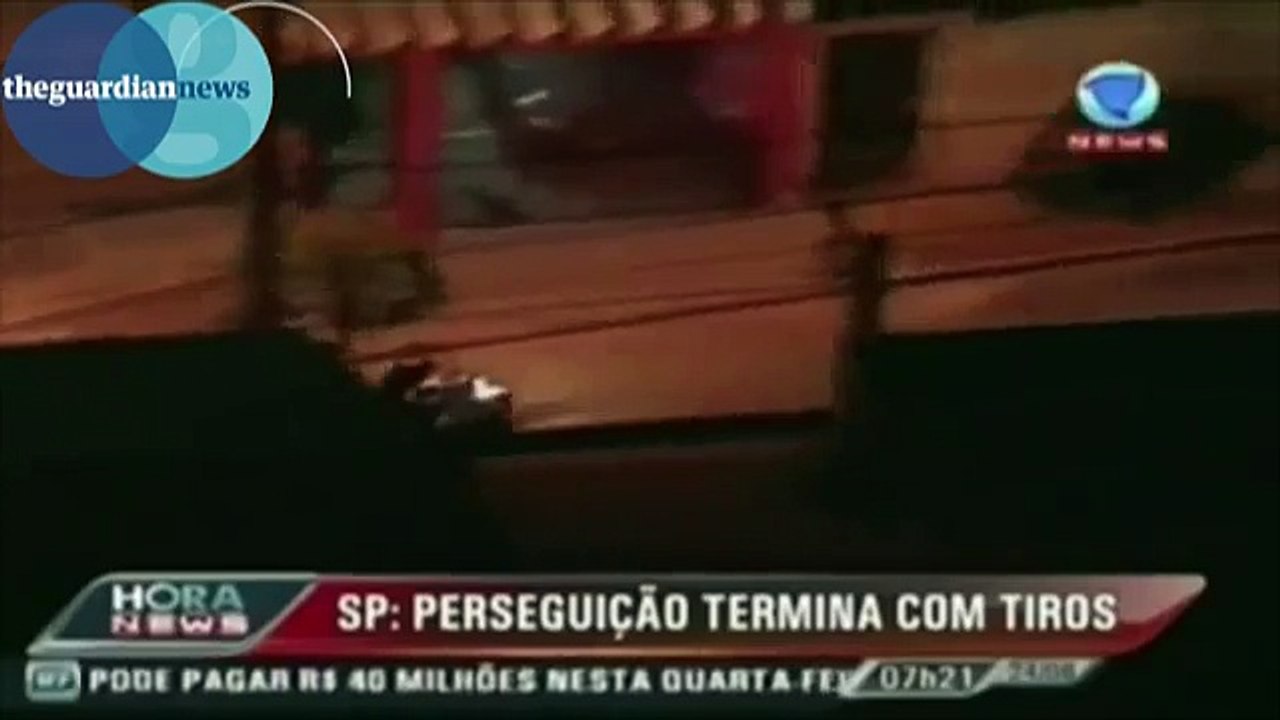 Motorcycle chase in Brazil ends with police officer shooting teens – video _ World news _ The Guardian