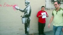 Banksy in Queens - Plea to help find missing boy delivered in front of latest of latest Banksy