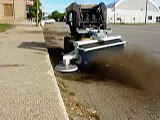 Skid Steer Attachment Cleaning Street Gutters