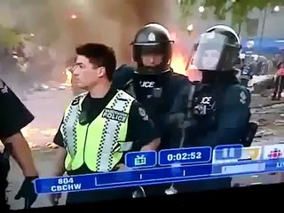 Vancouver Canucks Riot 2011: Guy gets hit in the balls by a flash bang grenade