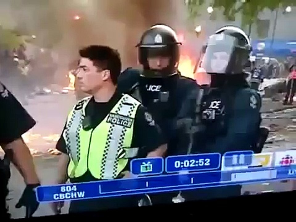 Vancouver Canucks Riot 2011: Guy gets hit in the balls by a flash bang grenade