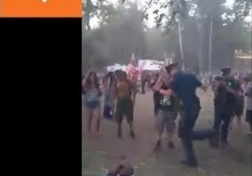 Michigan Police Officers Play Hopscotch at the Electric Forest Festival