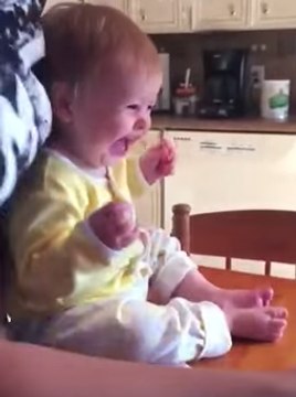 Delightful Baby Can't Stop Laughing at Her Parents' Juggling