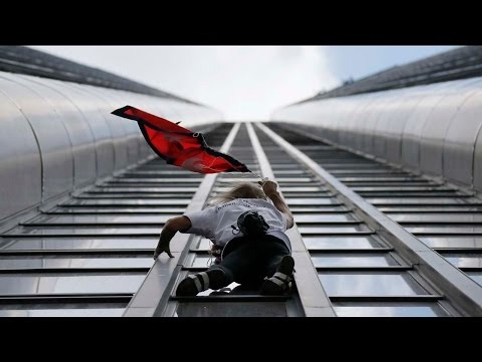 French ‘Spiderman’ Alain Robert climbs 689 ft Tower for Nepal Earthquake Victims