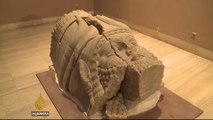 Hundreds of looted artefacts return to Iraq