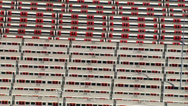 Aerials of London show traffic jams and parked tube trains