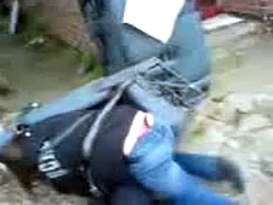 Two Girls stuck in a car seat