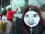Caricature mural 'Live' graffiti painting performance art