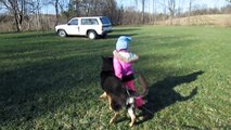 5 year old girl training a dog twice her size and a thousand times stronger than her