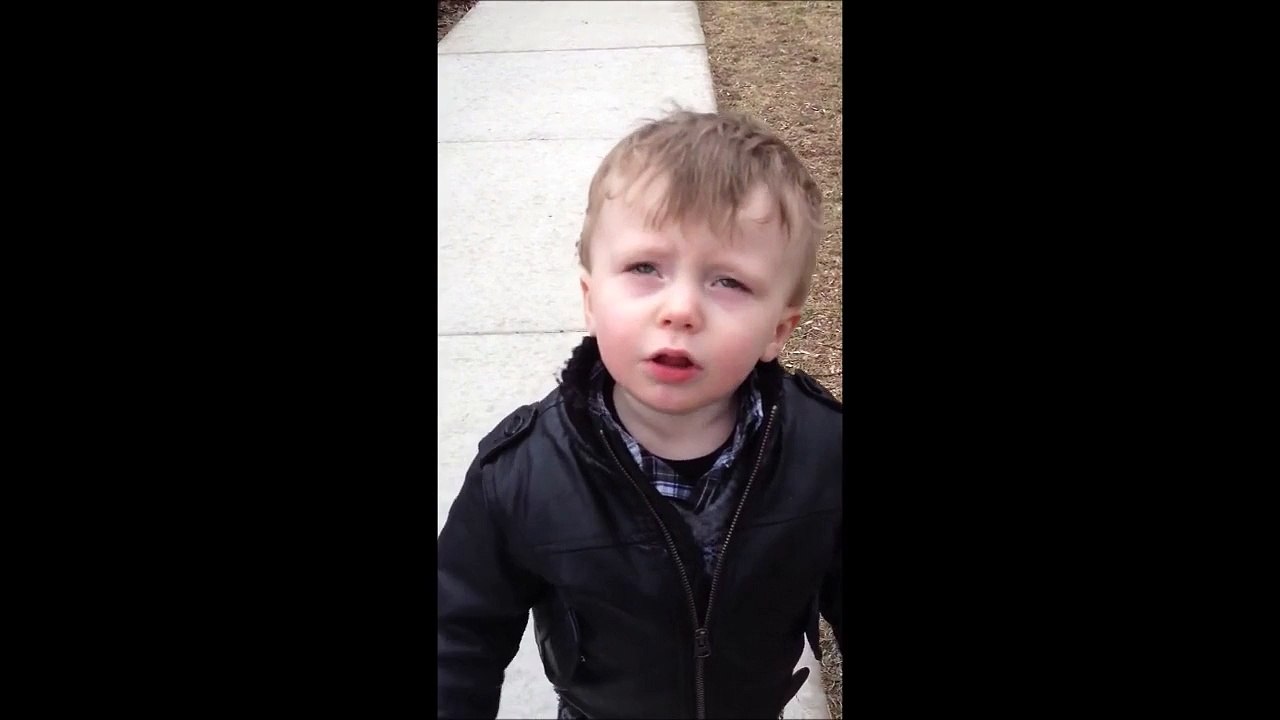 Boy getting mad at dog poop in the street