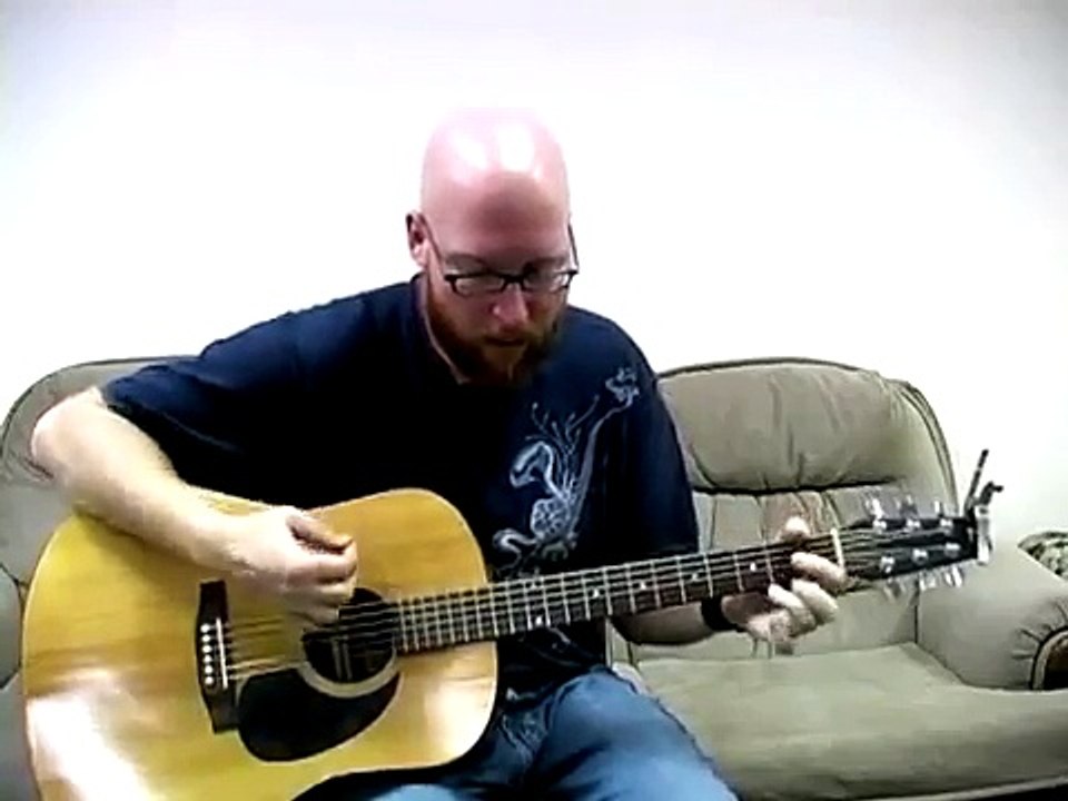 How To Play Acoustic Guitar Songs : How To Play "Give A Little Bit" On Acoustic Guitar