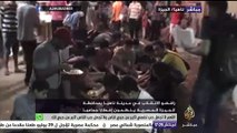 معارضون للانقلاب ينظمون إفطارا جماعيا بمدينة ناهيا بمحافظة الجيزة في مصر