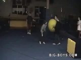 kid getting smacked in the face with a big ball