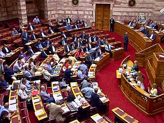 Ночь дебатов: Греческий парламент проголосует за пакет помощи