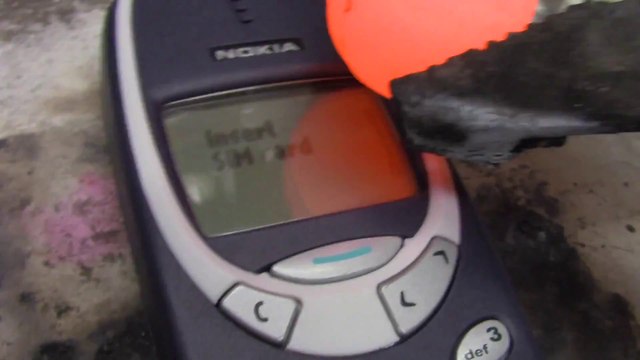 Red hot nickel ball burns vintage Nokia 3310 Phone!