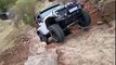 SUV Almost Flips Over Backward While Climbing Rocks