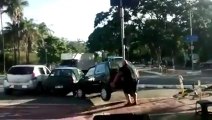 Strong Man lifting a Car - Awesome