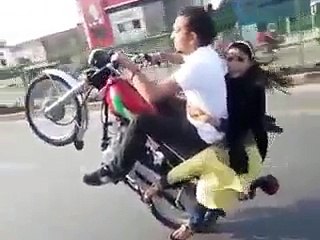 PAKISTANI BOY ONE WHEELING WITH GIRL