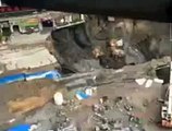 Giant Sinkhole Swallows Entire Apartment in Philippines