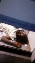 Funny man sleeping in ATM