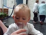 Baby tasting Lemon Juice, and he LOVES it!