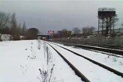 Via Rail train moving fast in snow