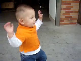 "Jump Jump Jump" says the Baby to the Dog