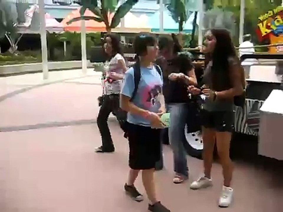Sluts dancing by a car.