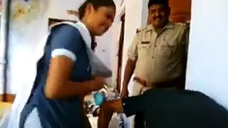 girl beating a boy in police station in India