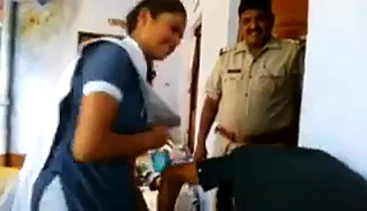 girl beating a boy in police station in India