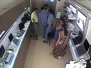 OMG!!! Lady stole Laptop under Skirt