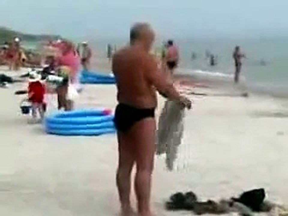 Funny Drunk Man on Beach